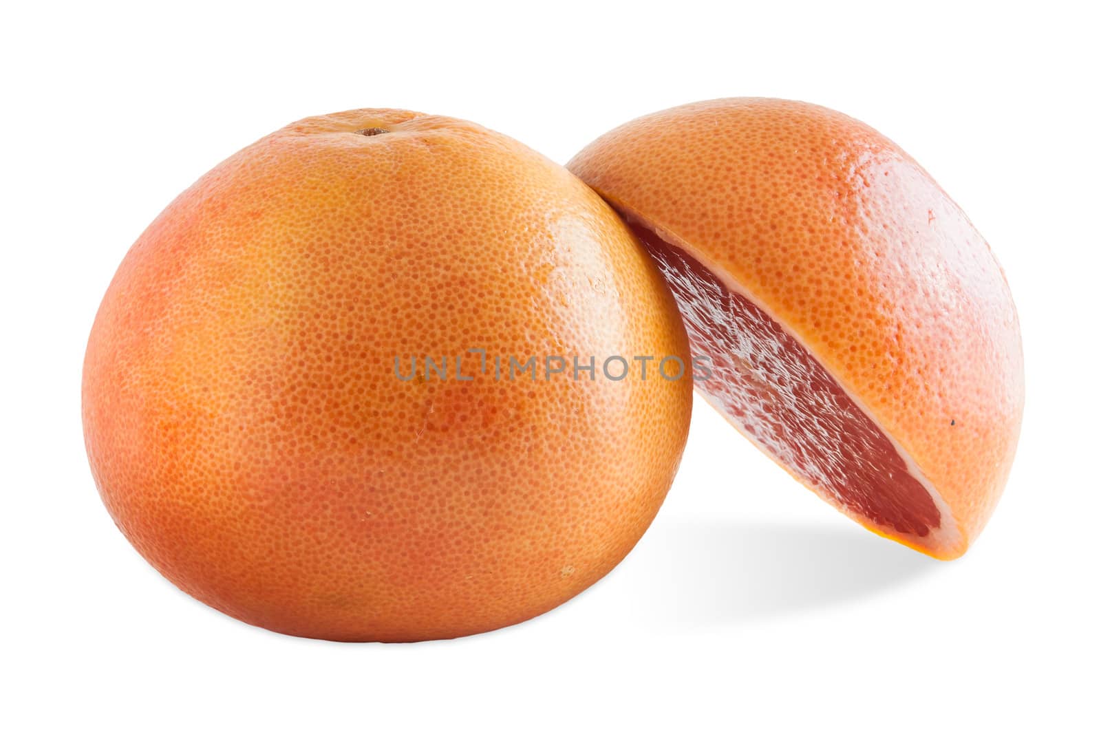Ruby grapefruits isolated on white background with clipping path