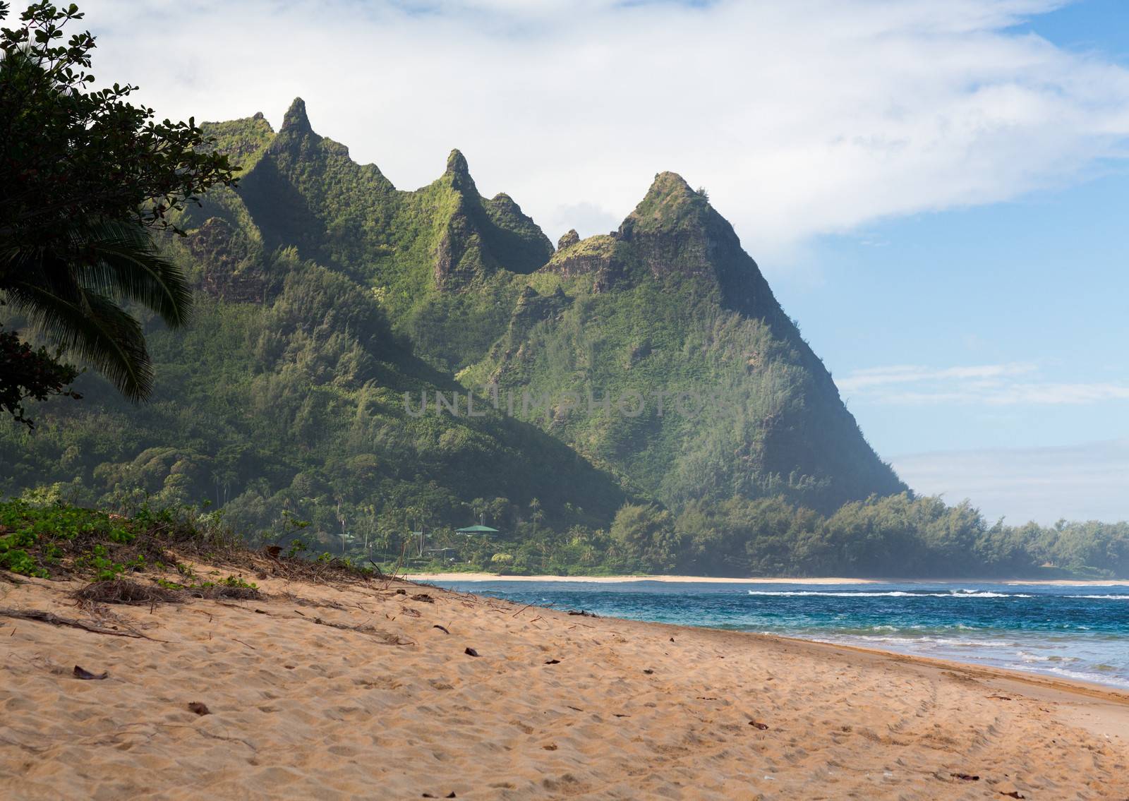 View down the sand at Tunnels Beach in winter on Hawaiian island of Kauai on North Shore
