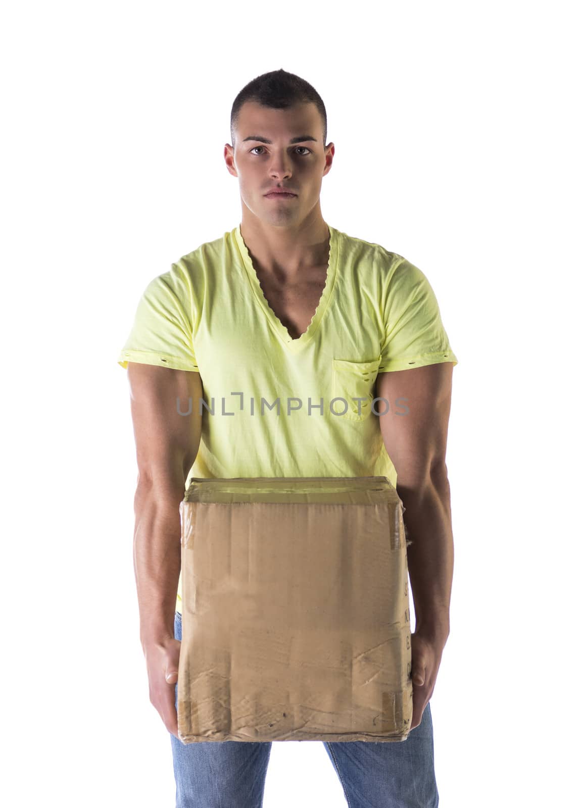Handsome young man carrying cardboard box, isolated on white