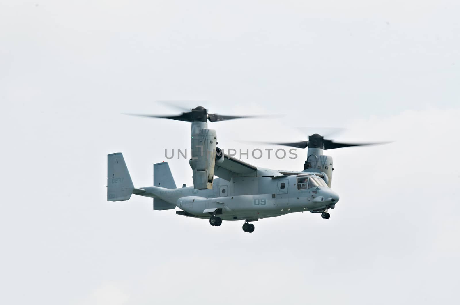 SINGAPORE - FEBRUARY 12: Bell Boeing V-22 Osprey hovering at Singapore Airshow, Changi Exhibition Centre in Singapore on February 12, 2014.