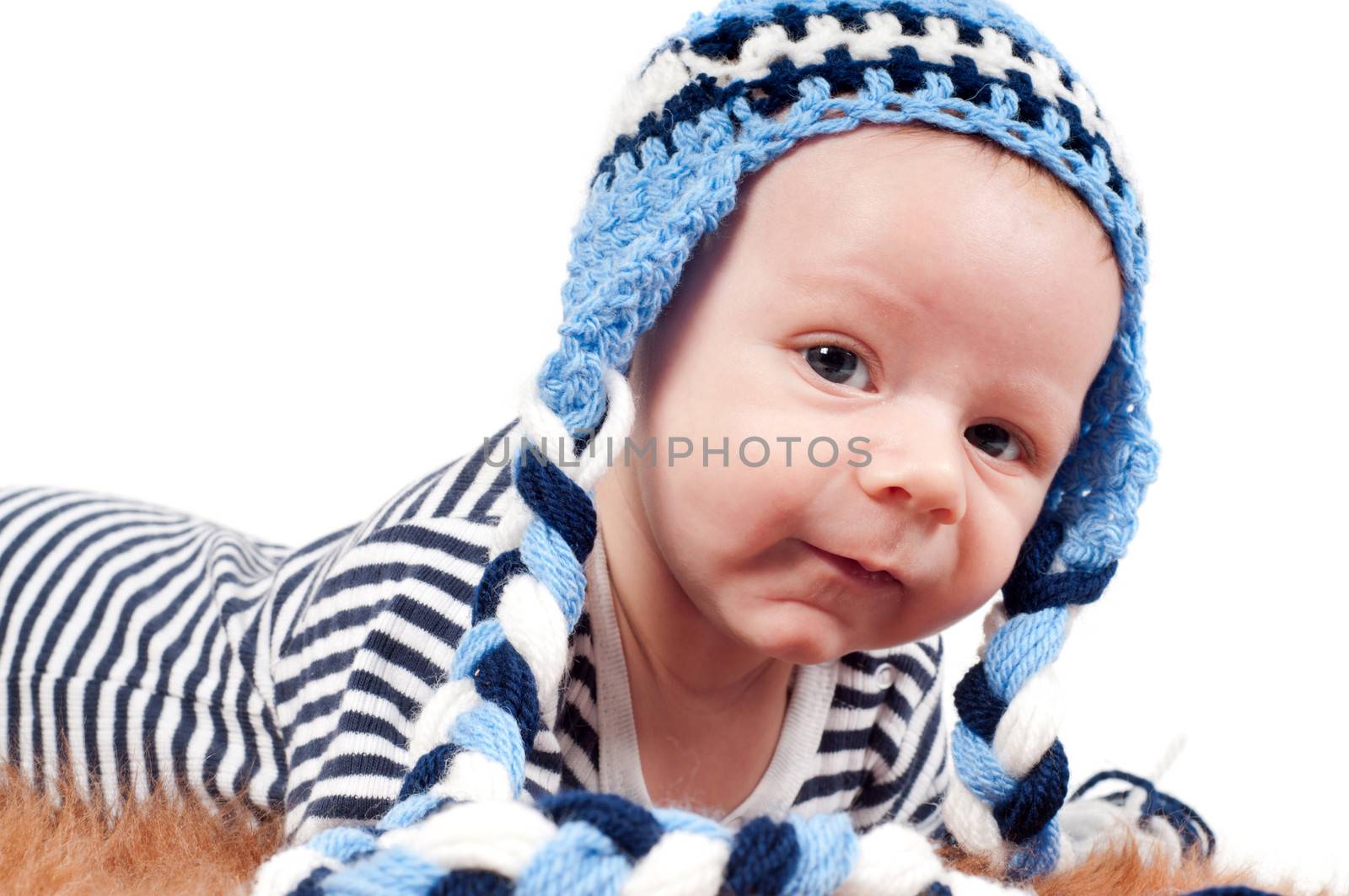 Shot of newborn baby lying on fur