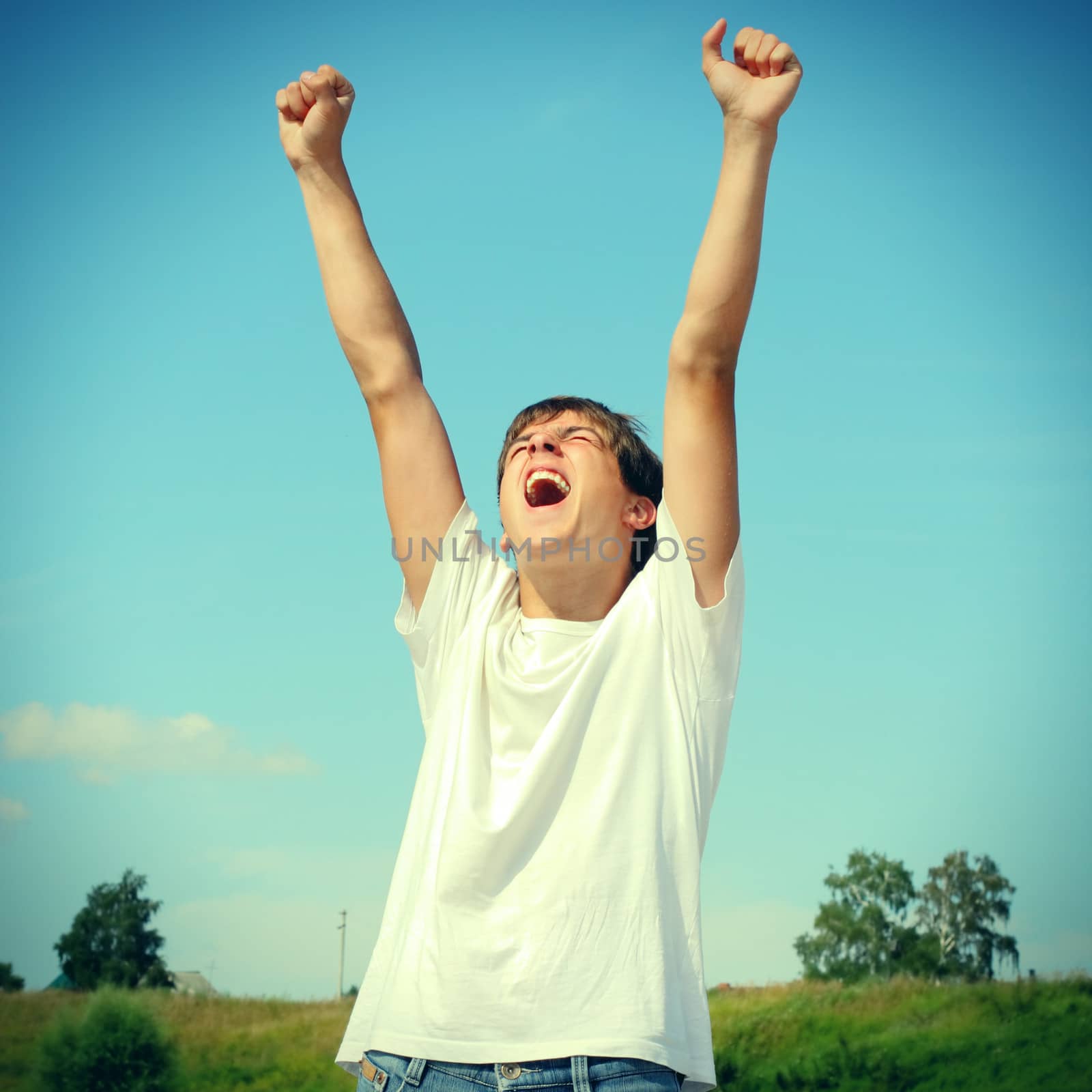 Toned photo of Happy Teenager at the Summer Day outdoor