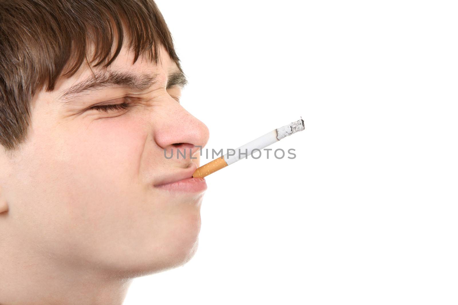 Side view of Teenage Face with cigarette on the White Background