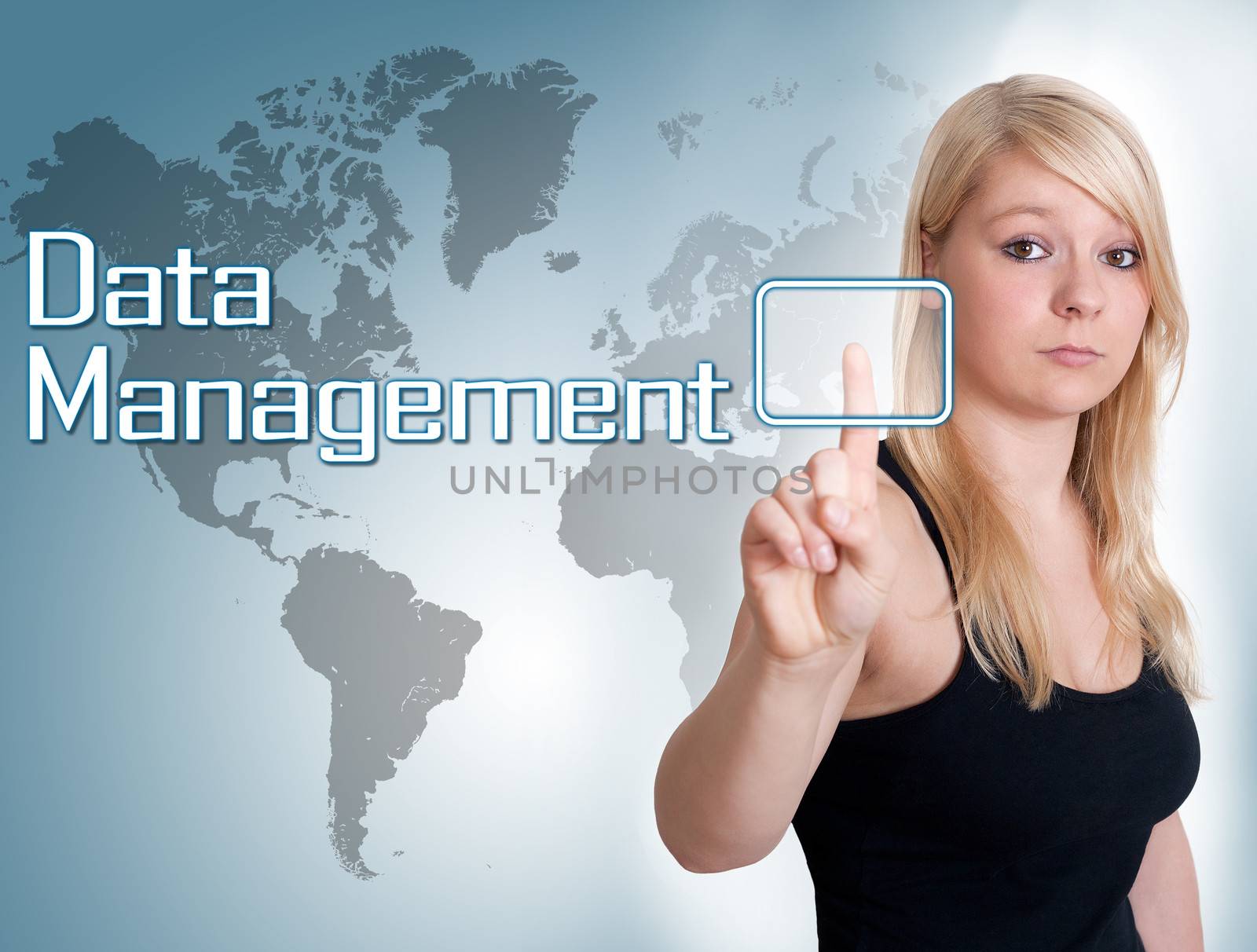 Young woman press digital Data Management button on interface in front of her