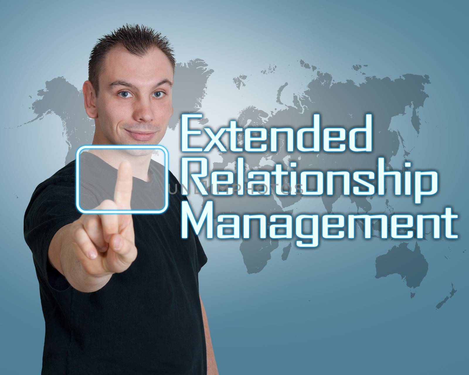 Young man press digital Extended Relationship Management button on interface in front of him