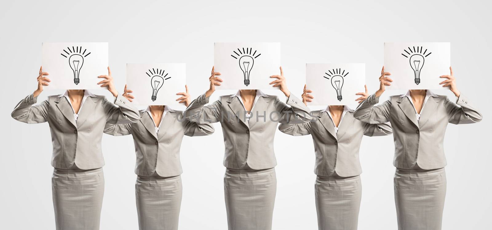 image of a businesswomen standing in a row, concept of teamwork