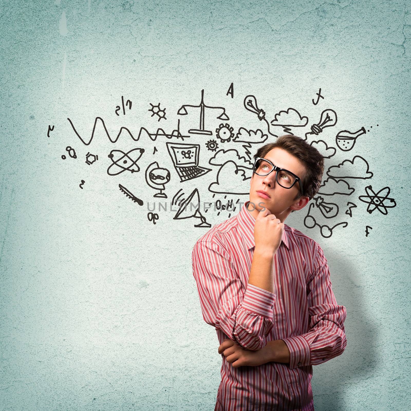 young man scientist in glasses thinking. next to it various painted symbols