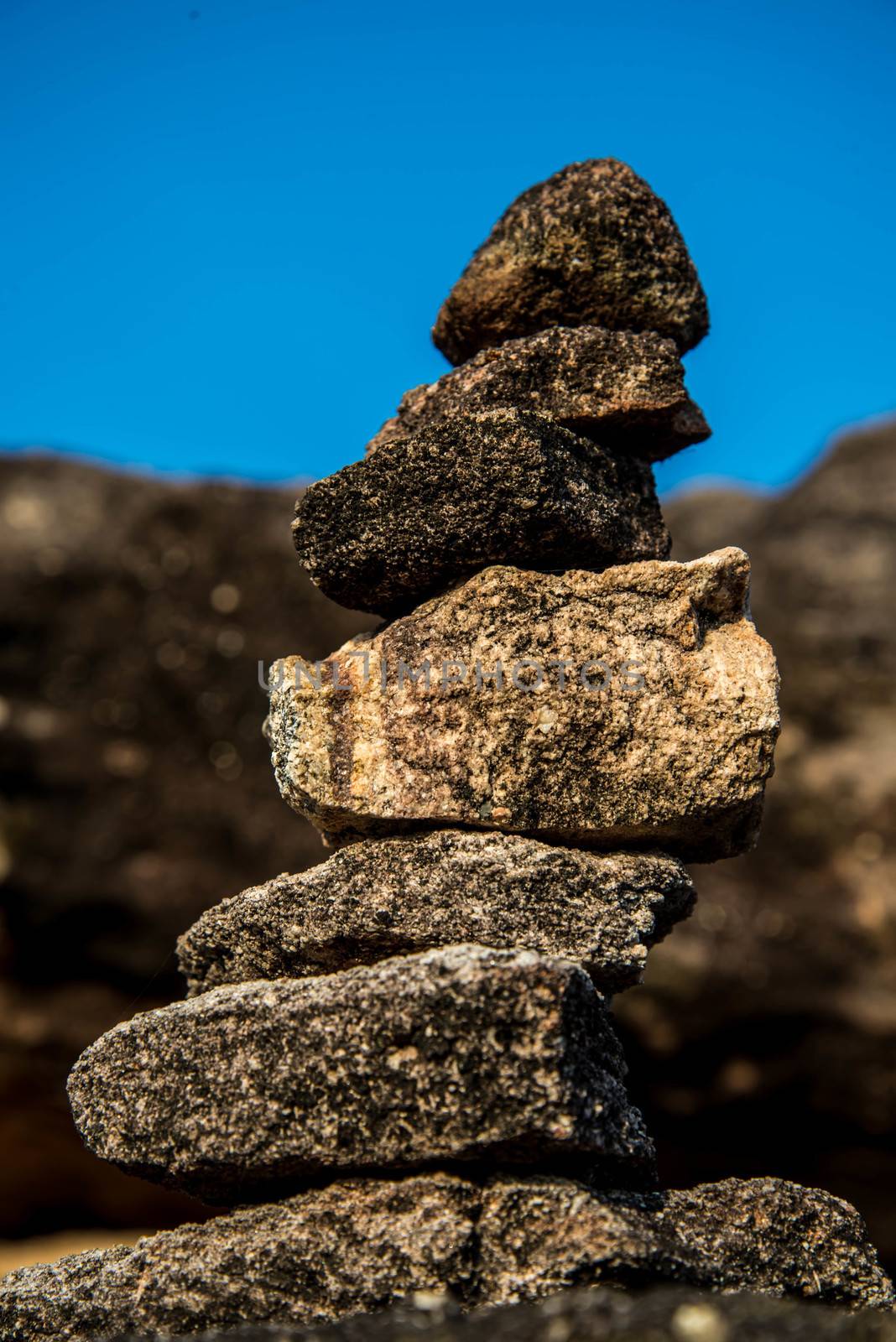 Stone heap and blue sky on the mountain in Thailand.