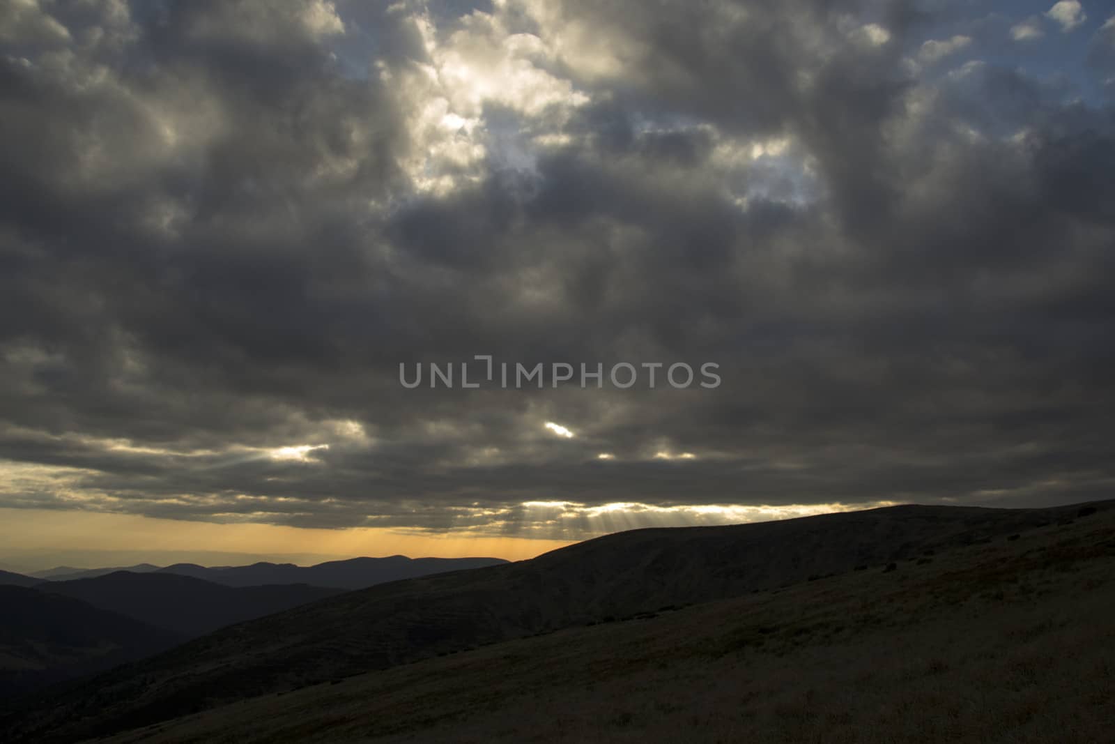 Rain clouds over the plateau in the mountains by Irene1601