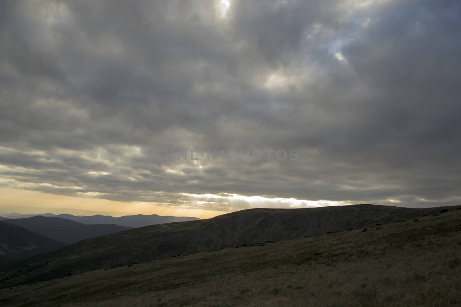 Rain clouds over the plateau in the mountains by Irene1601