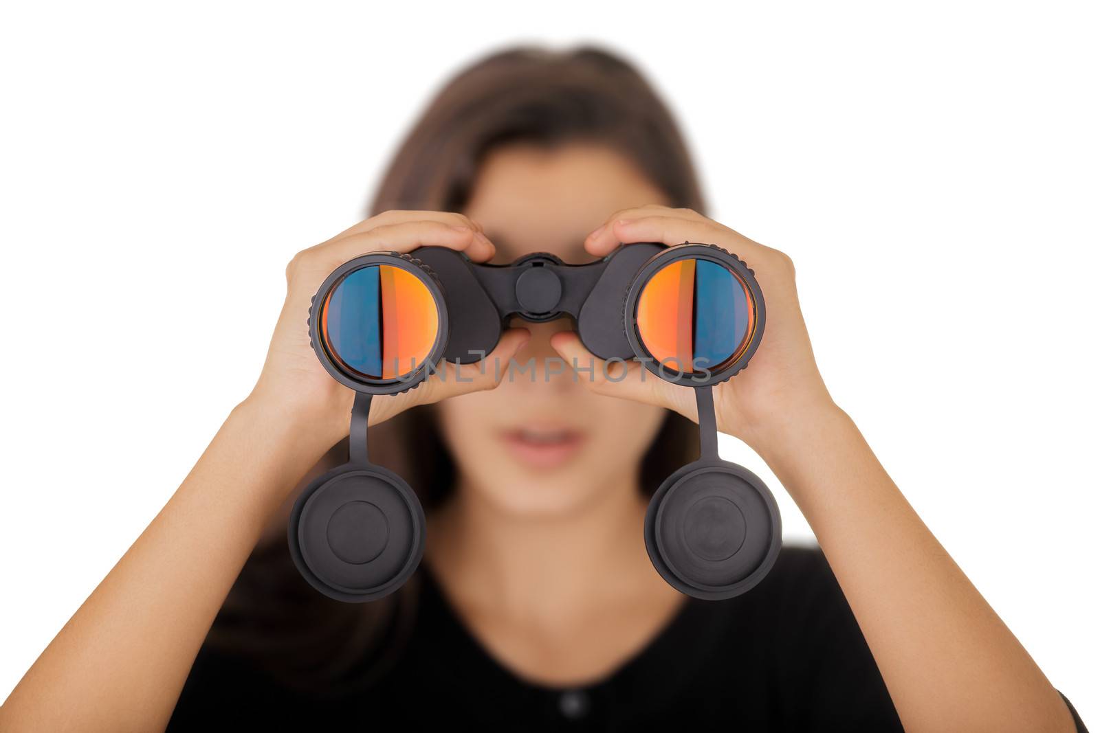 Beautiful girl looking through a pair of binoculars.