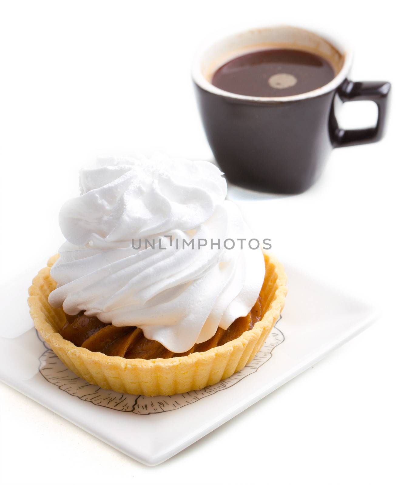 Cake with whipped cream and black coffee