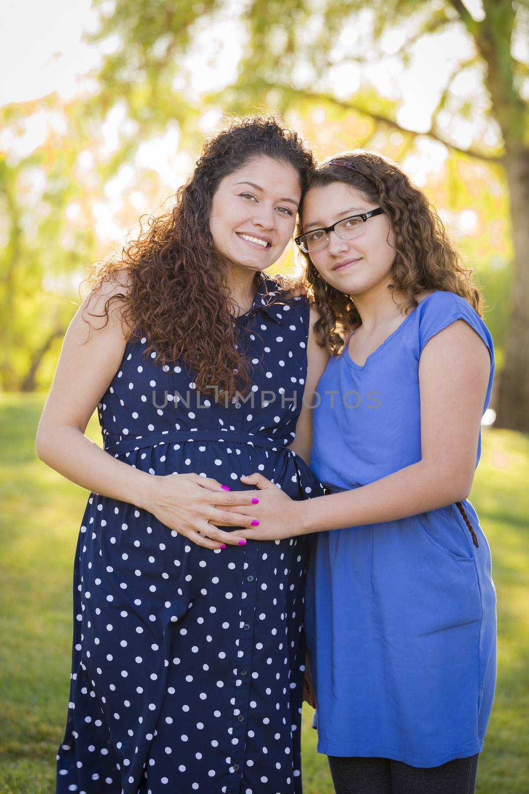 Hispanic Daughter Feels Baby Kick in Pregnant Mother's Tummy by Feverpitched