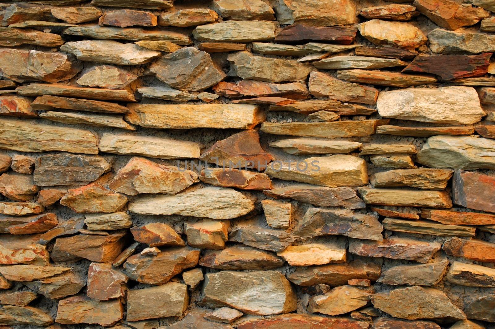 A close up shot of a stone feature wall