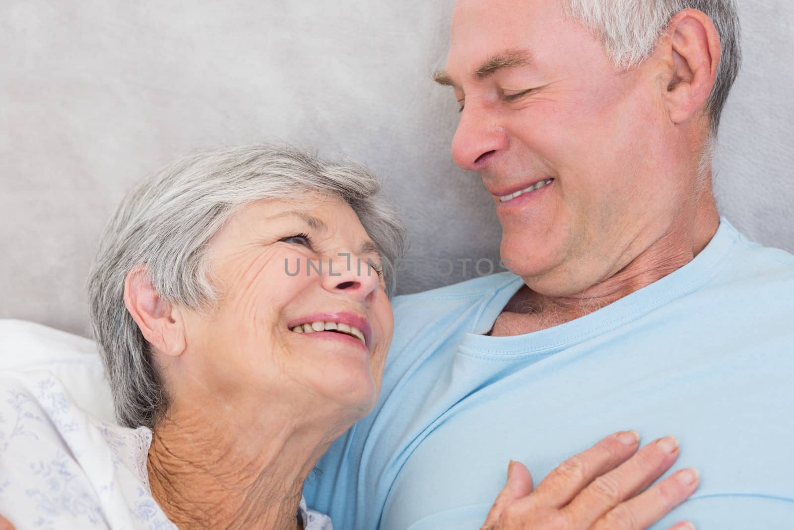 Closeup of affectionate senior couple looking at each other