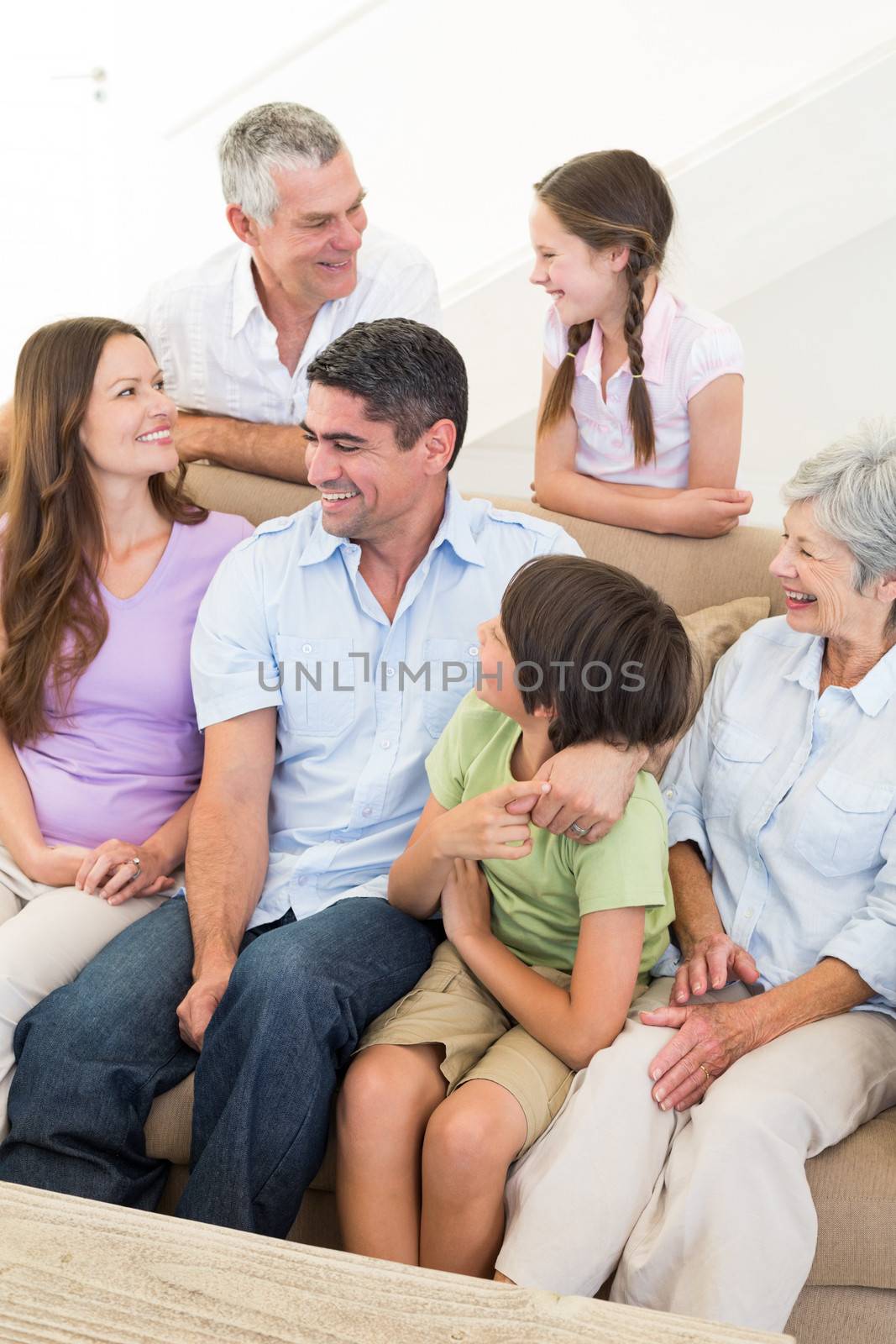 Smiling multigeneration family by Wavebreakmedia