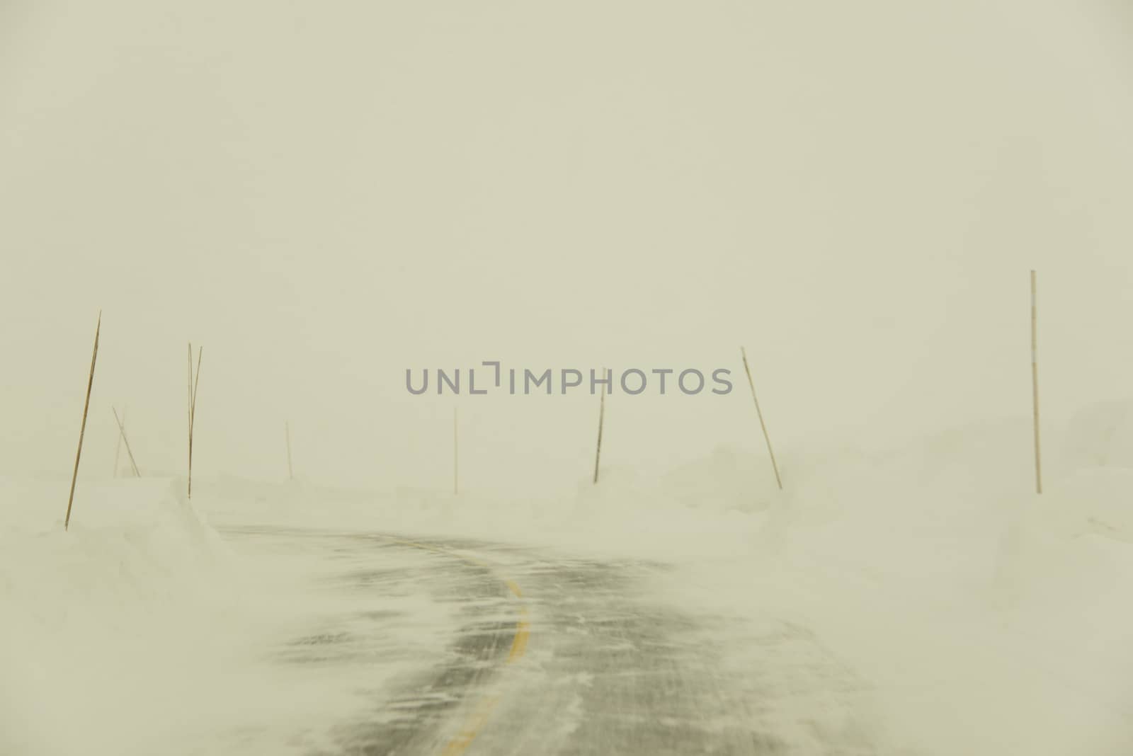 A high mountain road in a snow blizzard