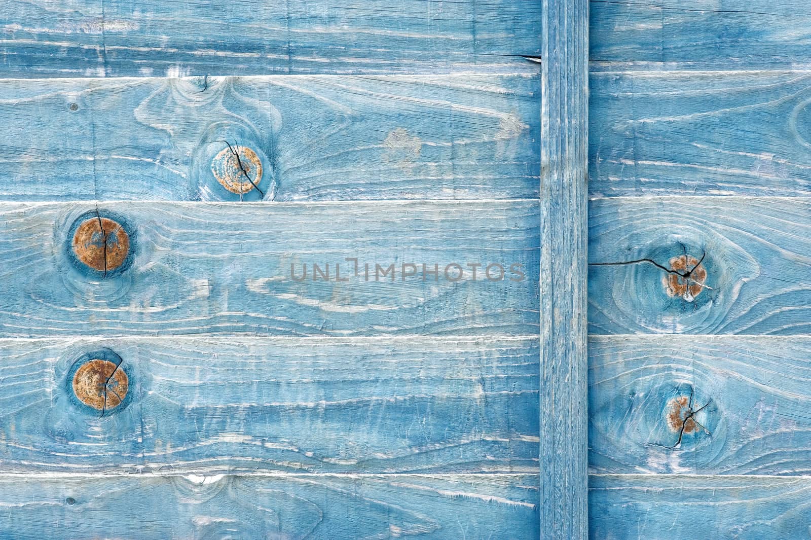 blue stained weathered wood fencing panel background