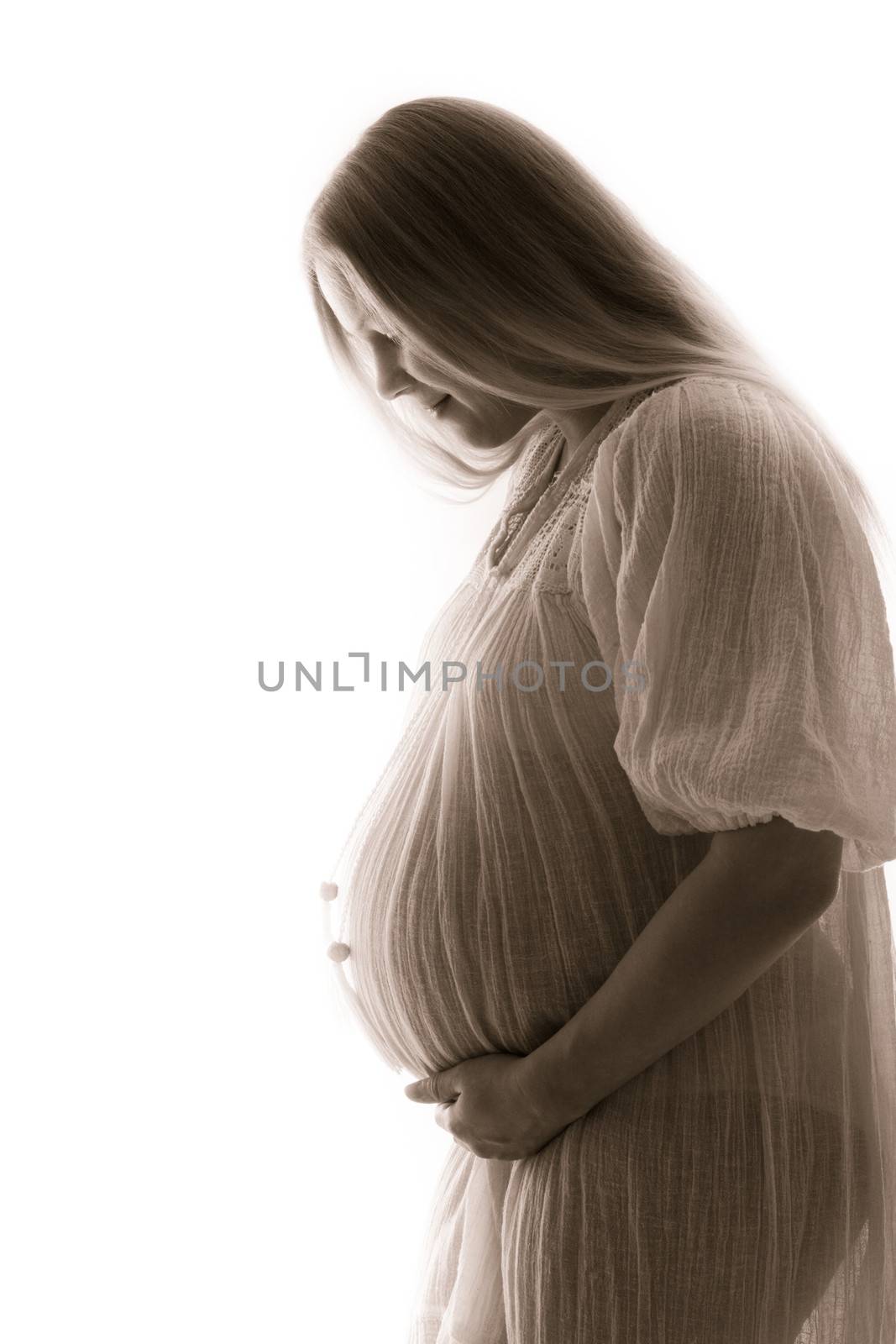 Blonde caucasian pregnant woman isolated on white