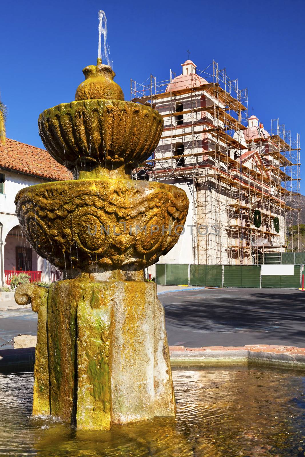 Fountain White Abobe Mission Santa Barbara Construction California.  Founded in 1786 at the end of Father Junipero Serra life.