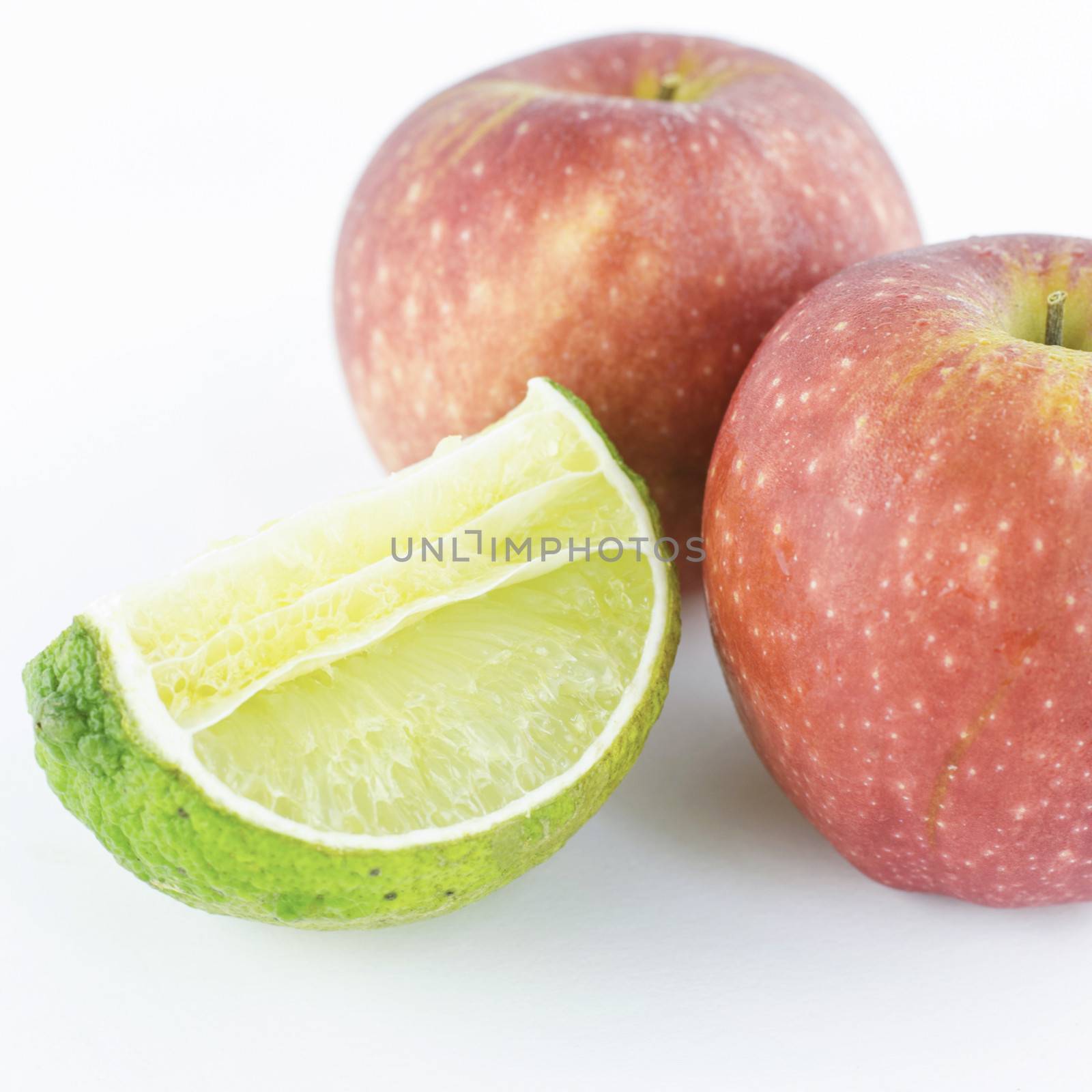apple and lime isolated on white background by ammza12