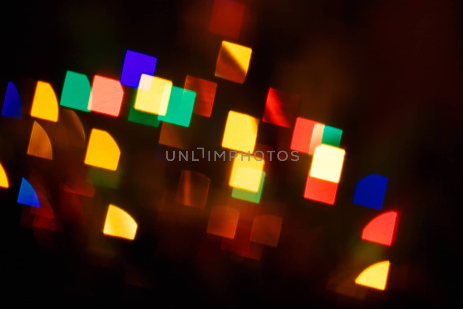 Abstract bokeh background in the form of squares on the night street