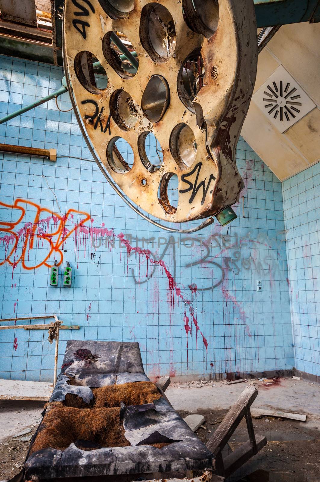 dirty operating room in an abandoned hospital