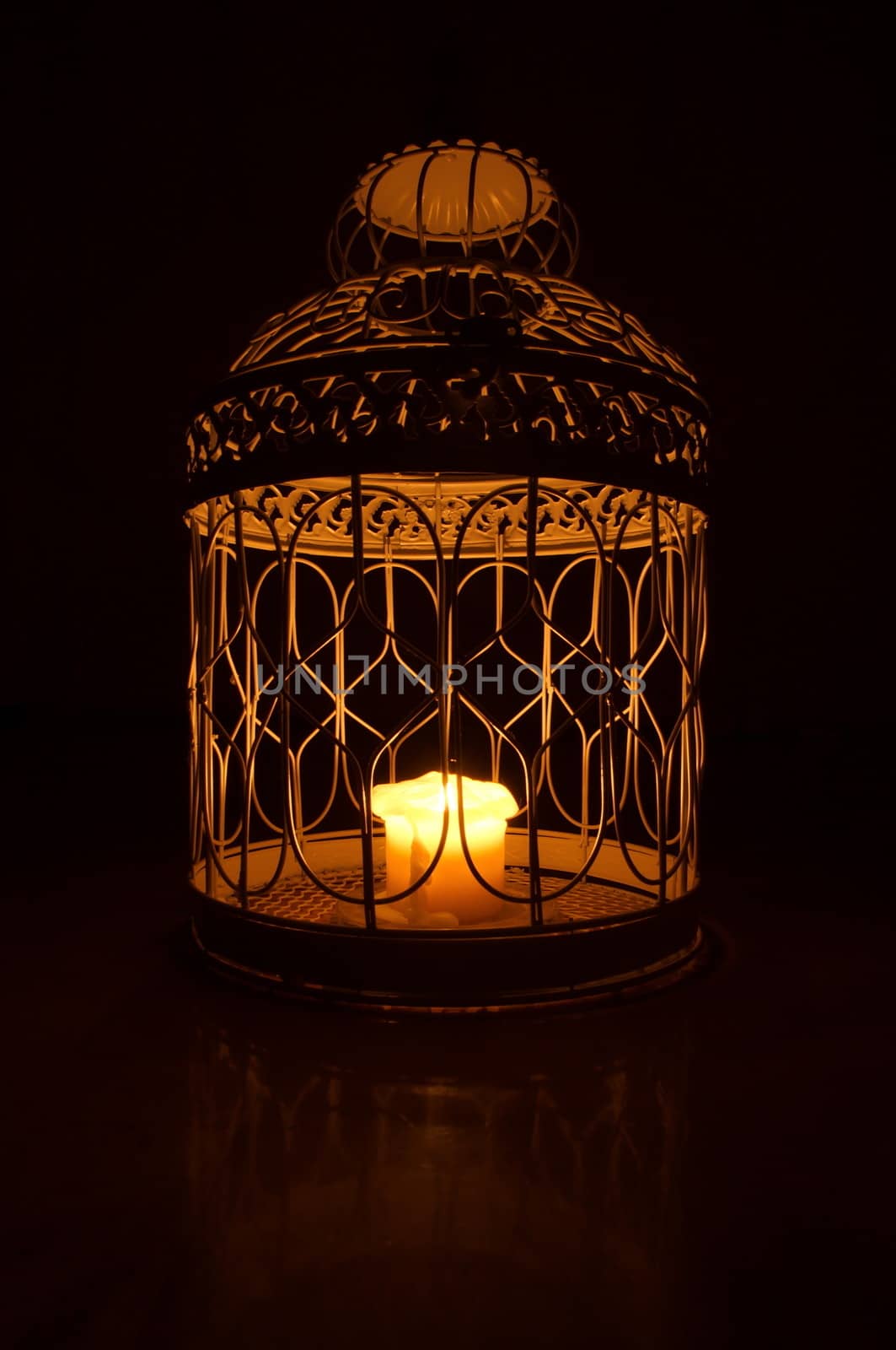 Candle in a cage by anderm