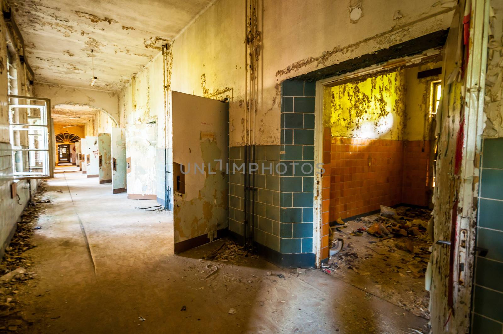 Long corridor in an abandoned dirty building