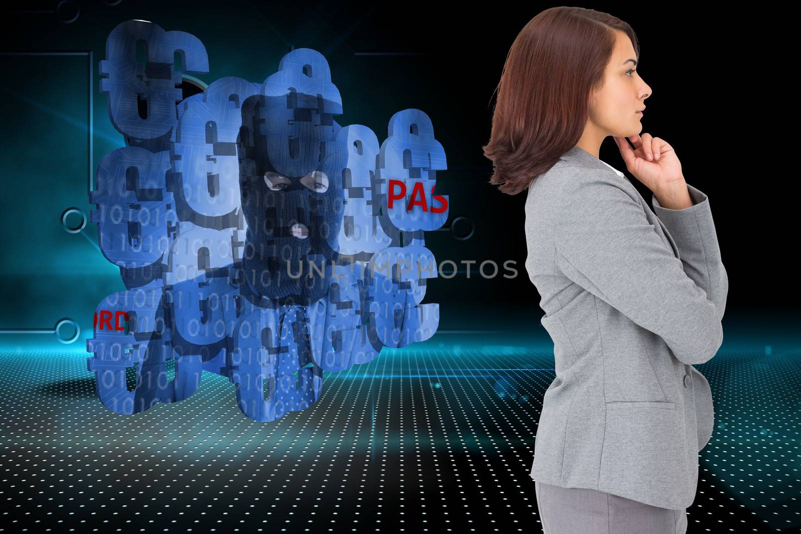 Concentrating businesswoman against keyhole on technological background