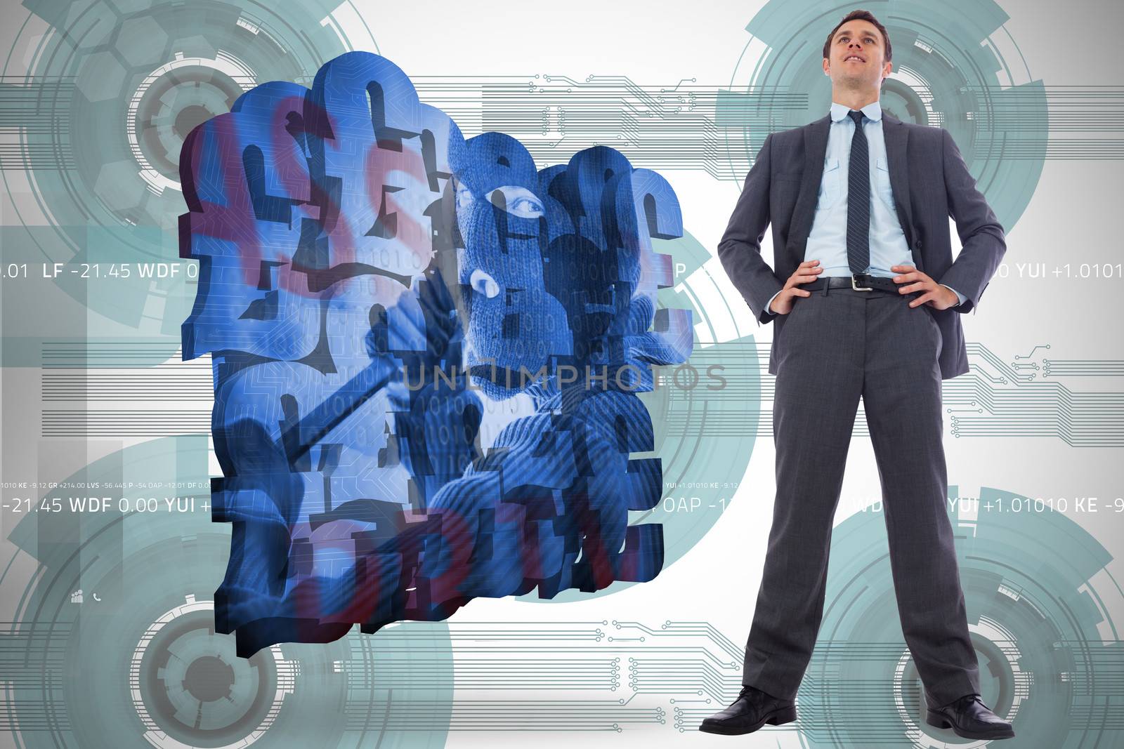 Composite image of happy businessman with hands on hips by Wavebreakmedia