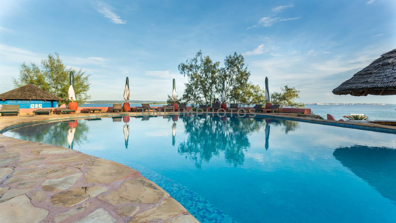 A swimming pool overlooking the Indian Ocean at a beautiful vacation spot