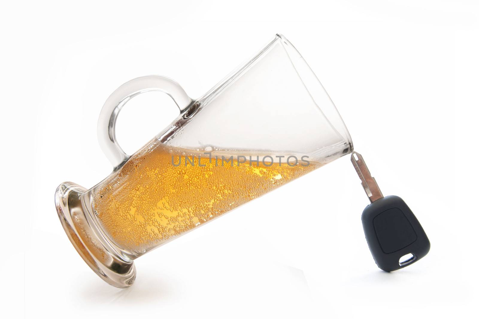 Beer glass balanced on top of car keys 