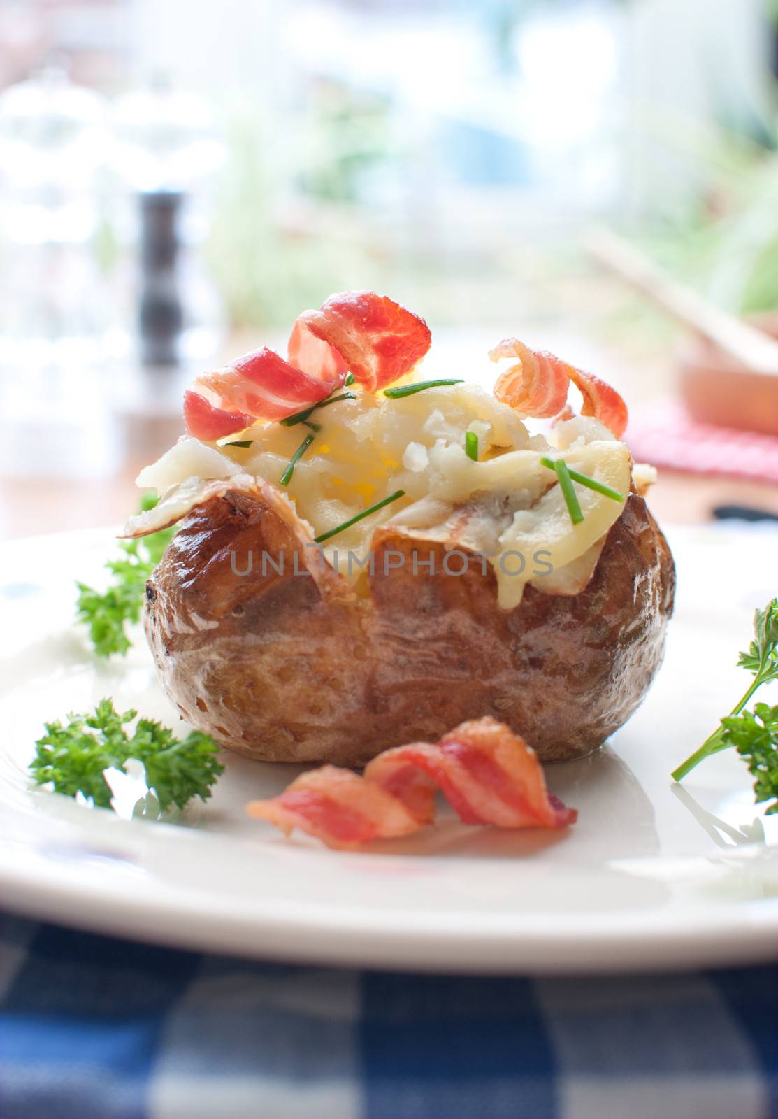 Baked potato with bacon and cheese