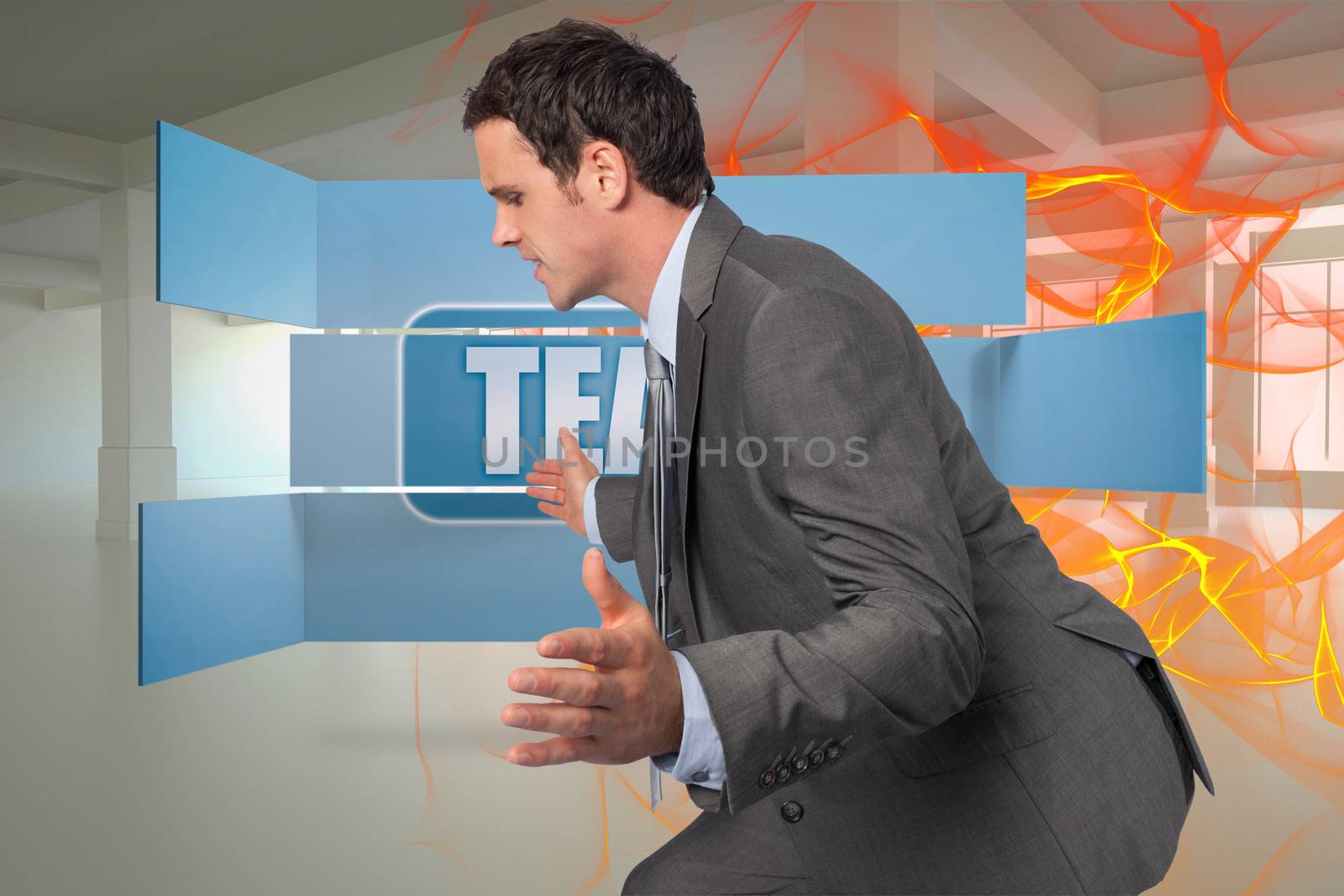 Businessman posing with hands out against abstract design in orange