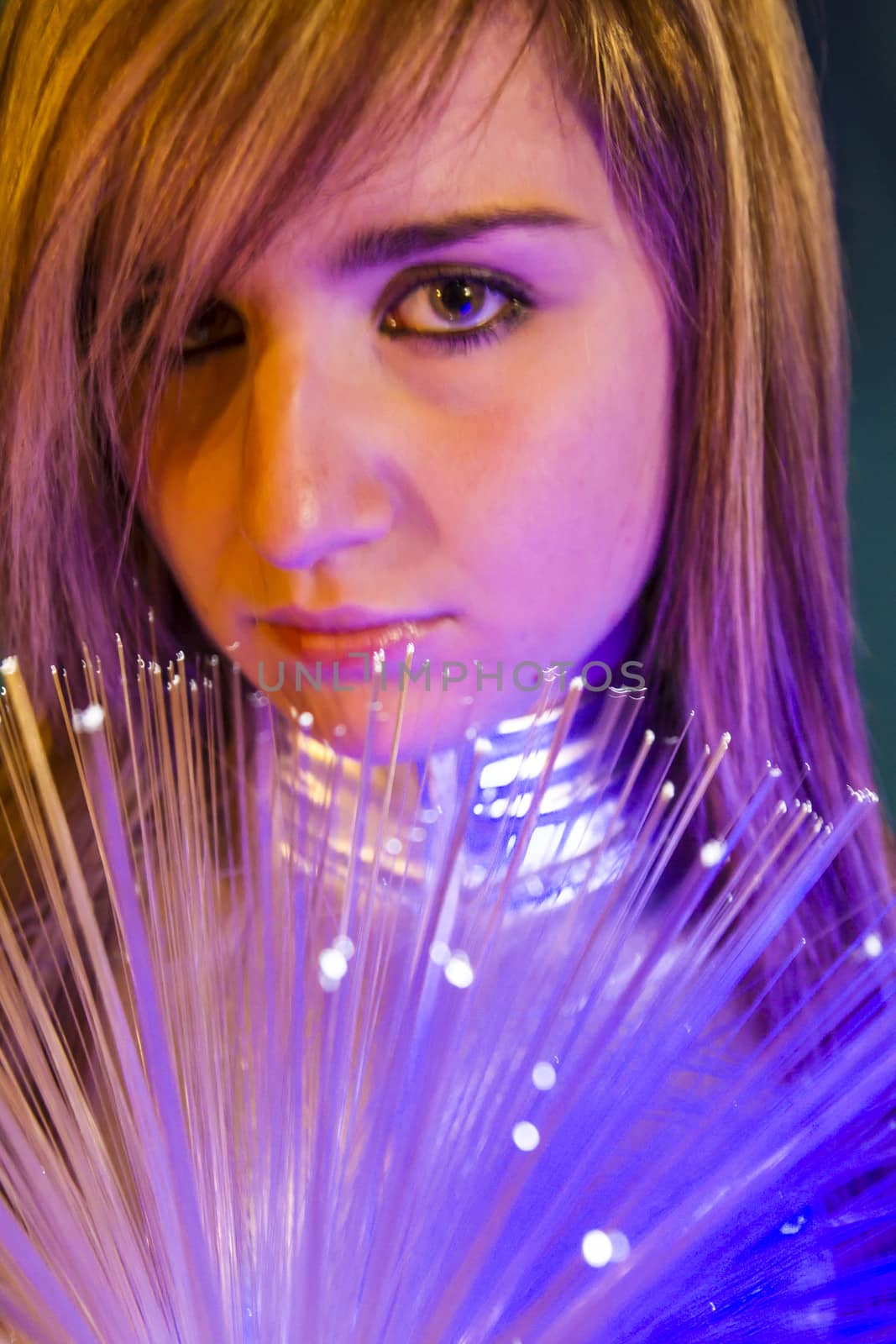 Future.Fiber Optic concept, woman with modern lights