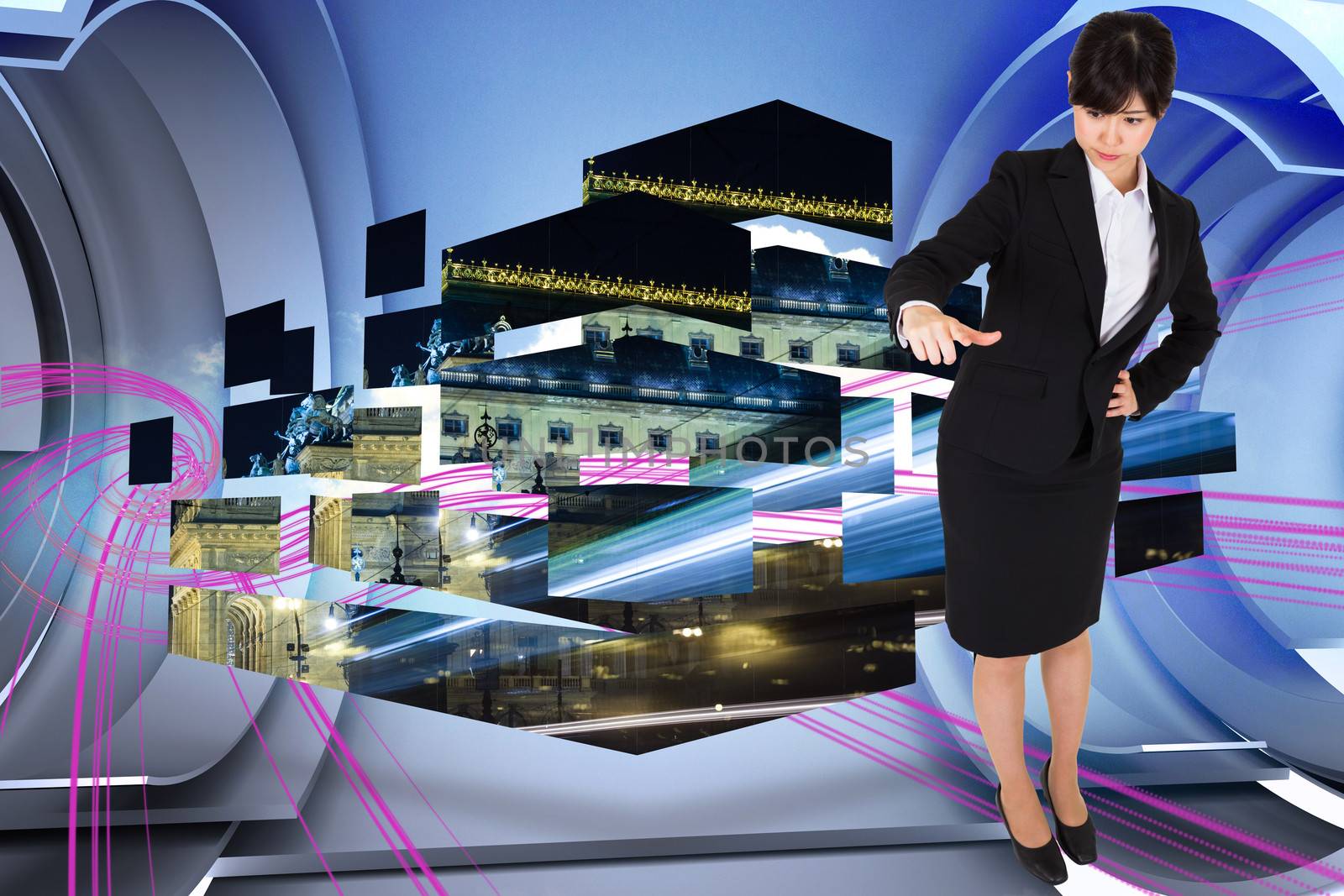 Businesswoman pointing against abstract pink design in futuristic structure