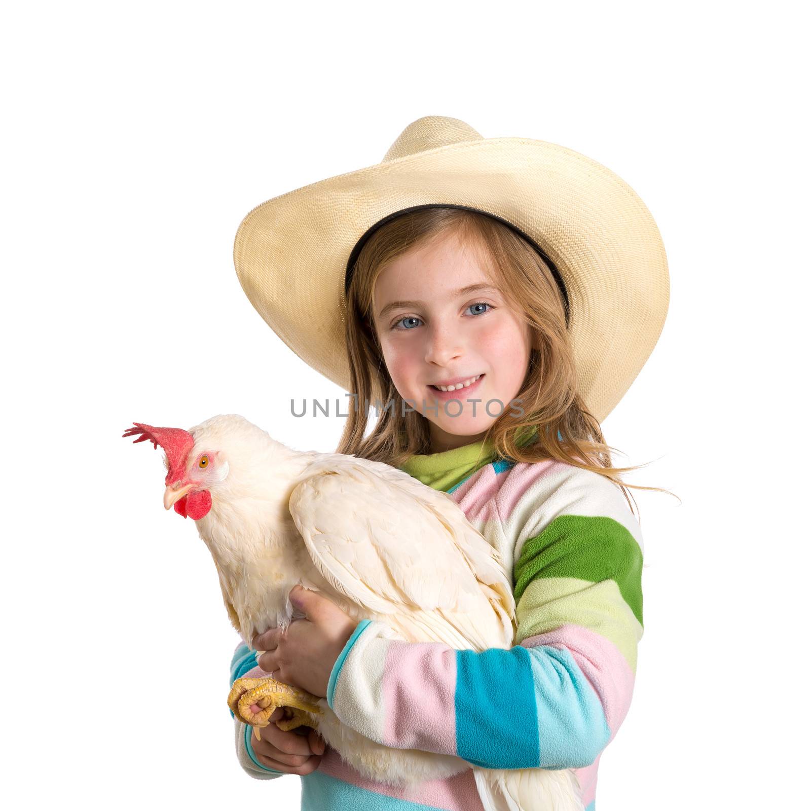 Blond kid girl farmer holding white hen on arms by lunamarina