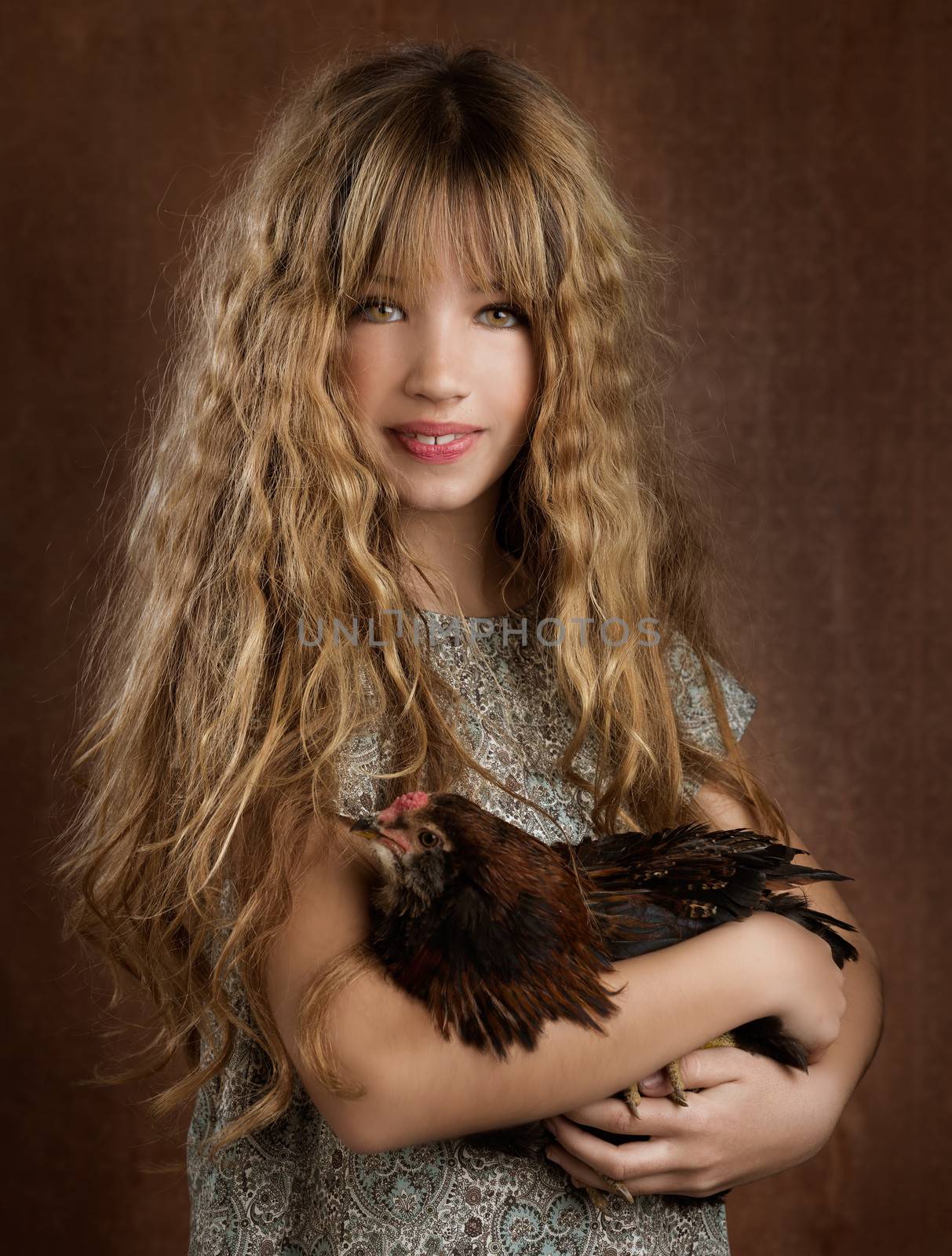 children fashion farmer girl holding hen in retro vintage background