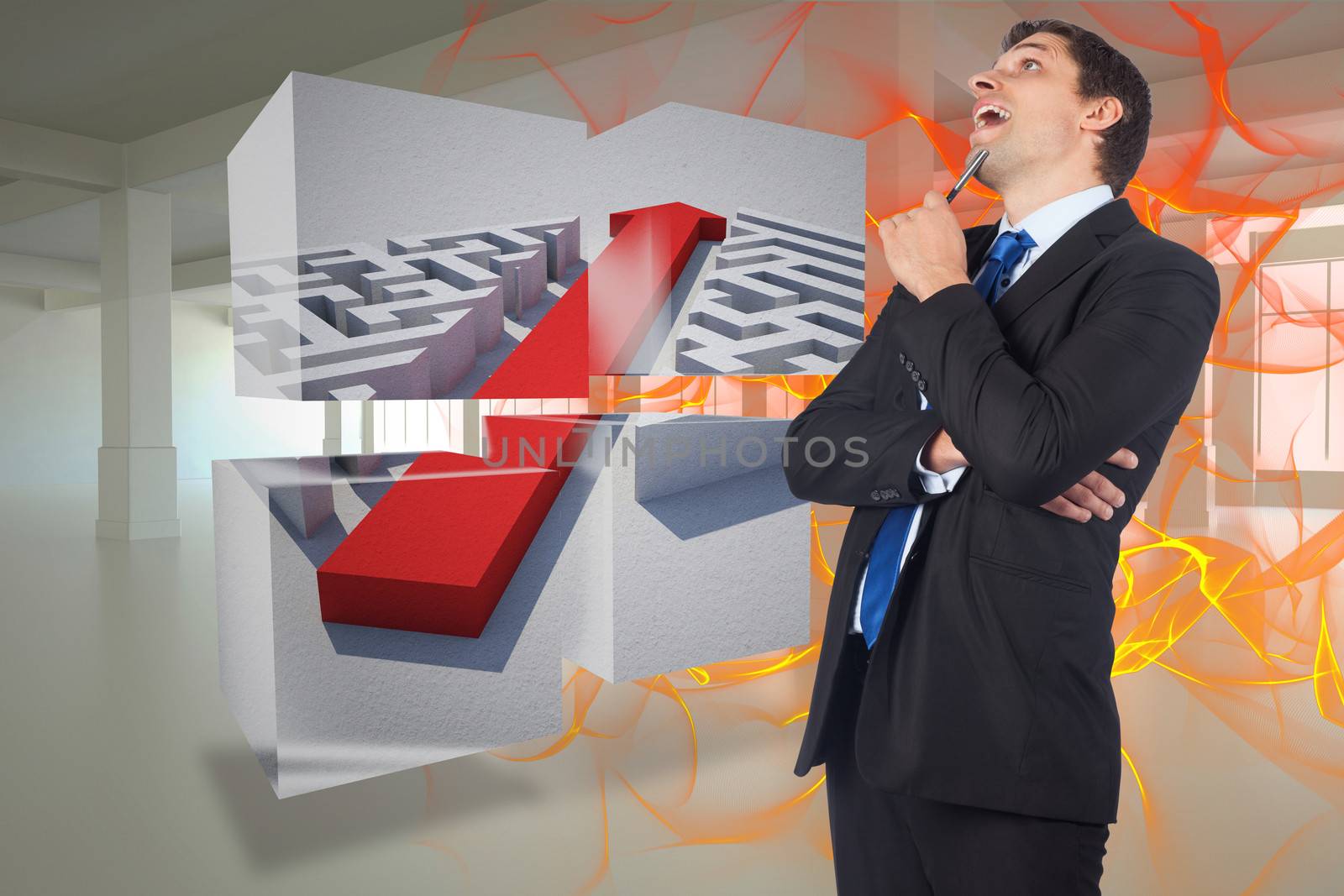 Thinking businessman holding pen against abstract design in orange