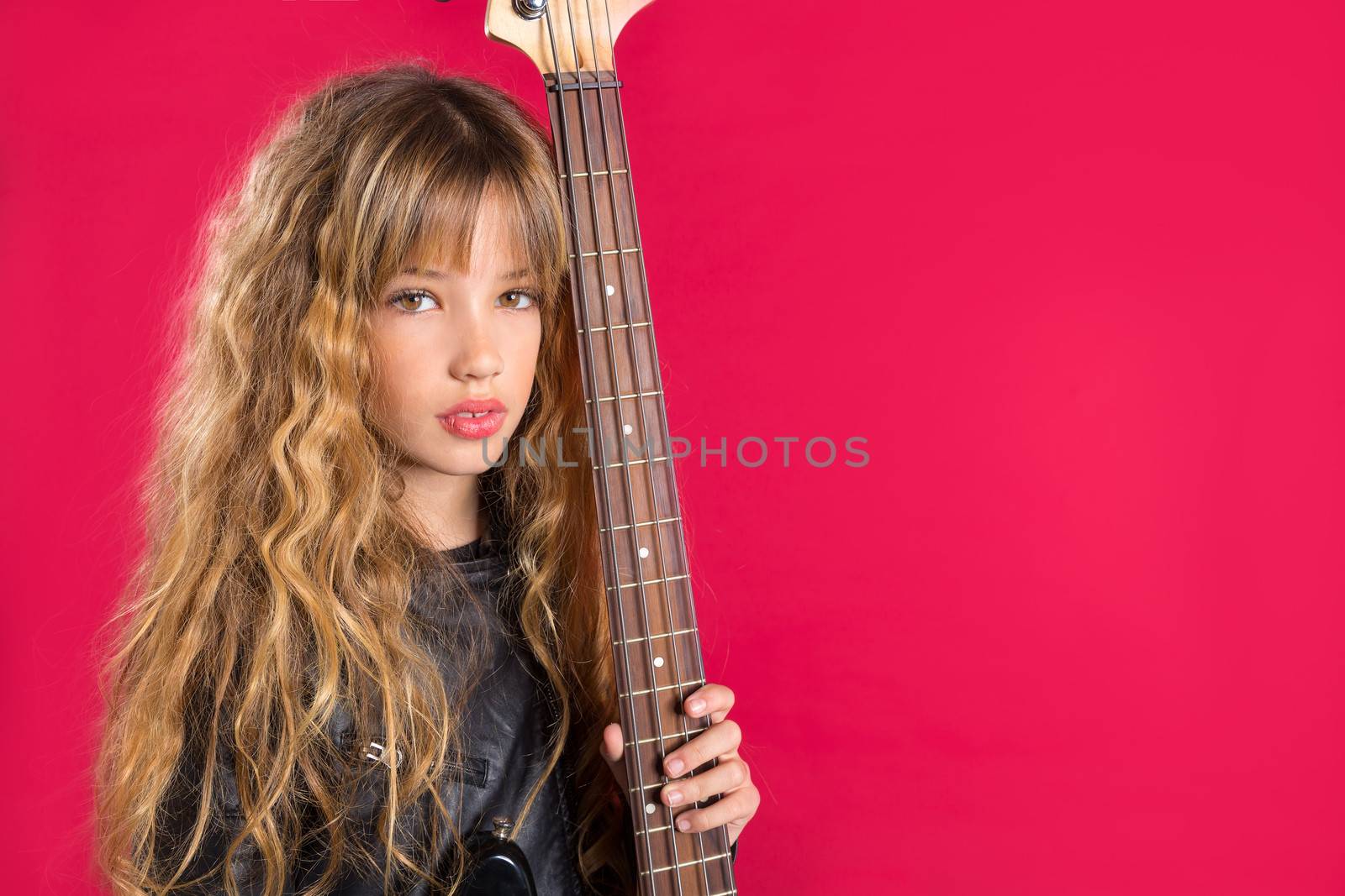 Blond Rock and roll girl with bass guitar on red by lunamarina