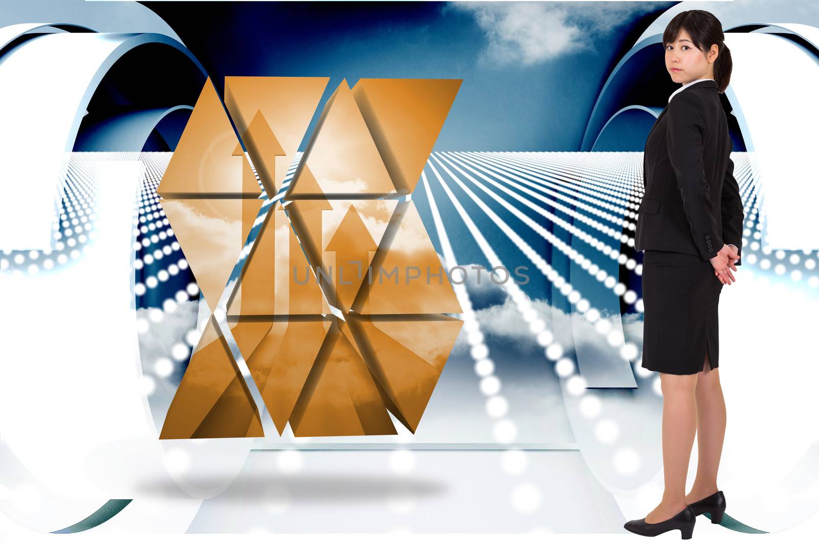 Composite image of serious businesswoman by Wavebreakmedia