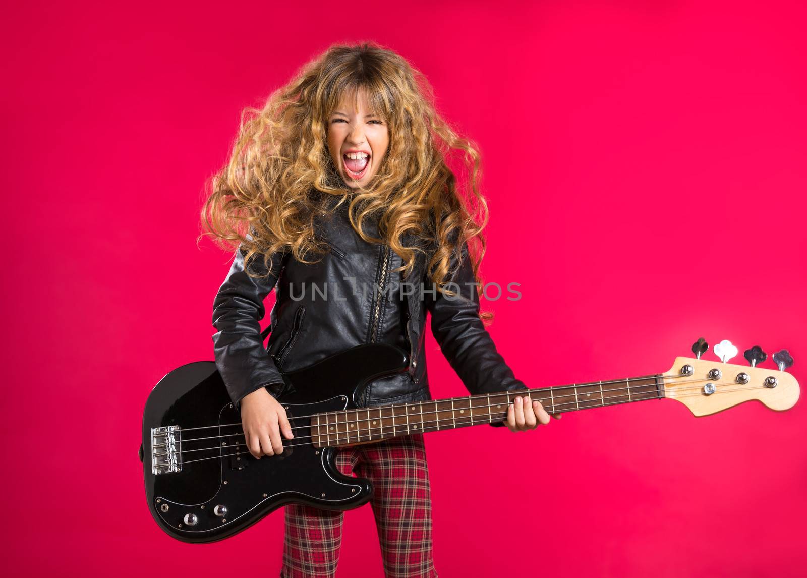 Blond Rock and roll girl playing bass guitar on red background