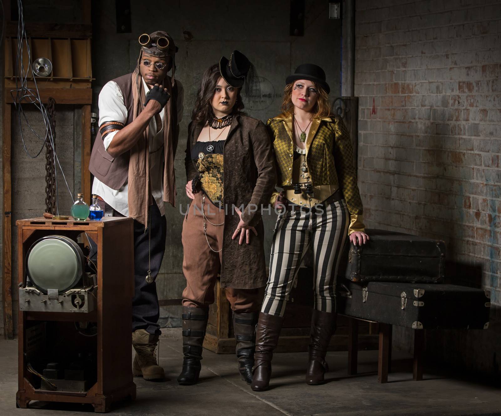 Three Young Diverse Steampunks in Retro Lair