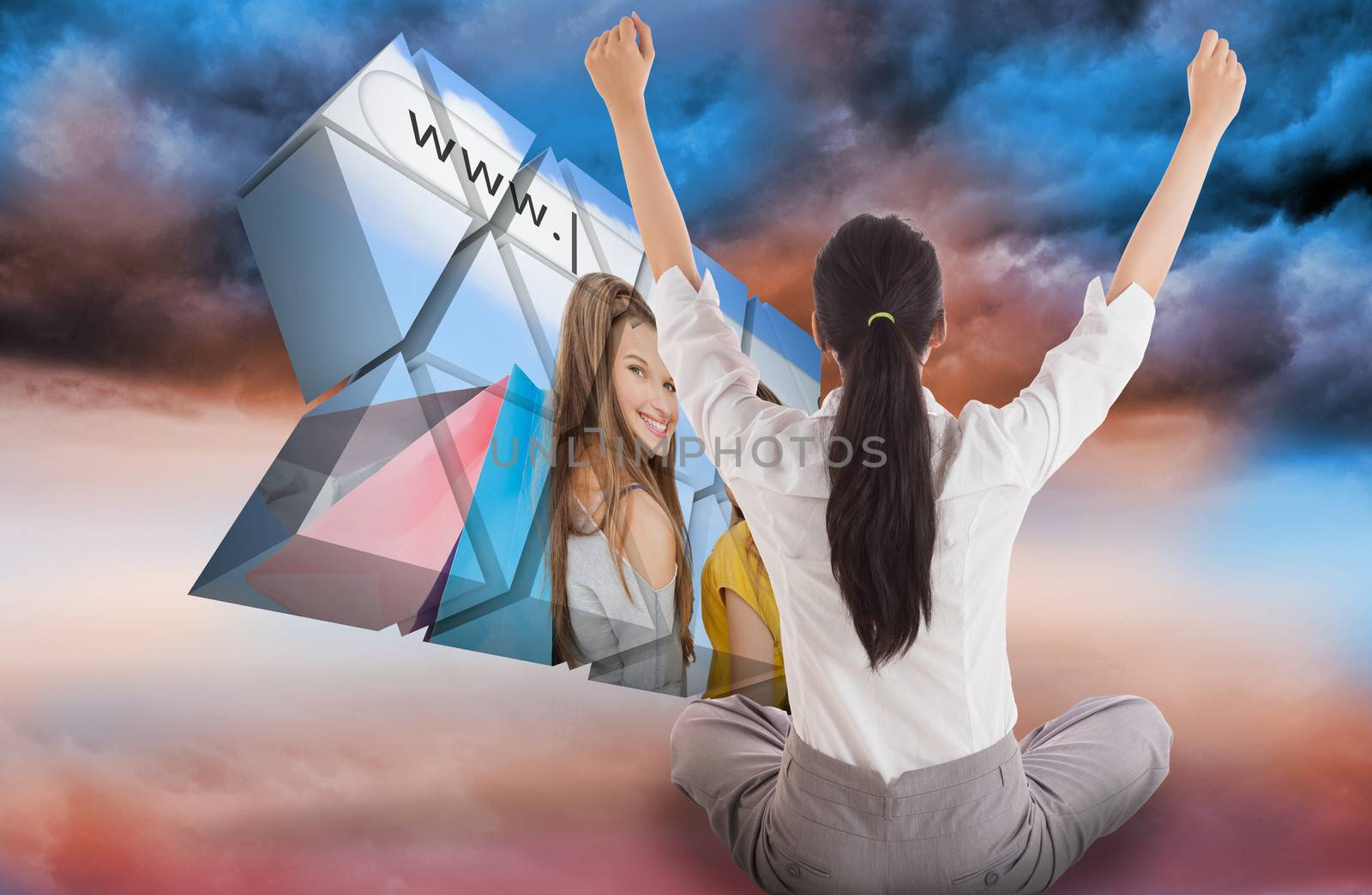 Composite image of businesswoman sitting cross legged cheering by Wavebreakmedia