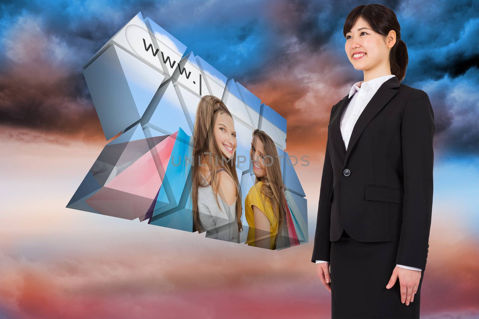 Smiling businesswoman against blue orange cloudy sky background