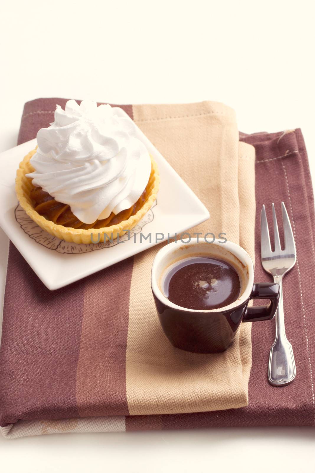 Coffee and cake with whipped cream
