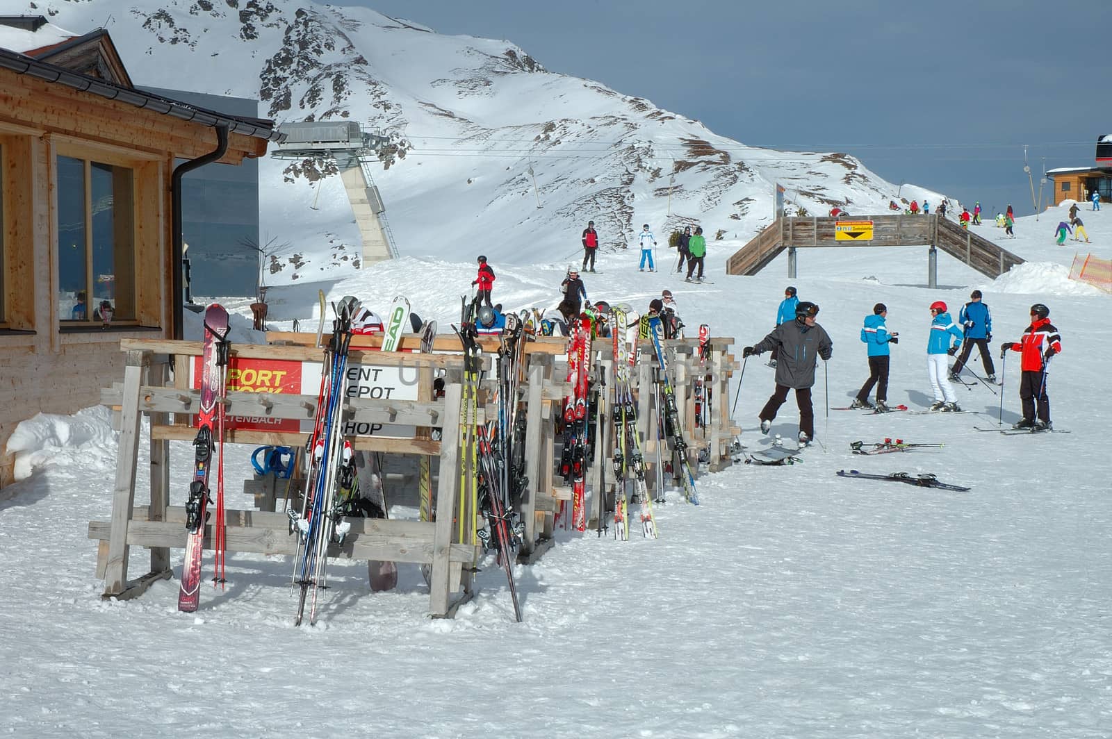 Kaltenbach, Austria - February 04: Ski and unidentified skiers nerby drag lift on Ofelerjoch peak nearby Kaltenbach in Zillertal in Austria 04.02.2014