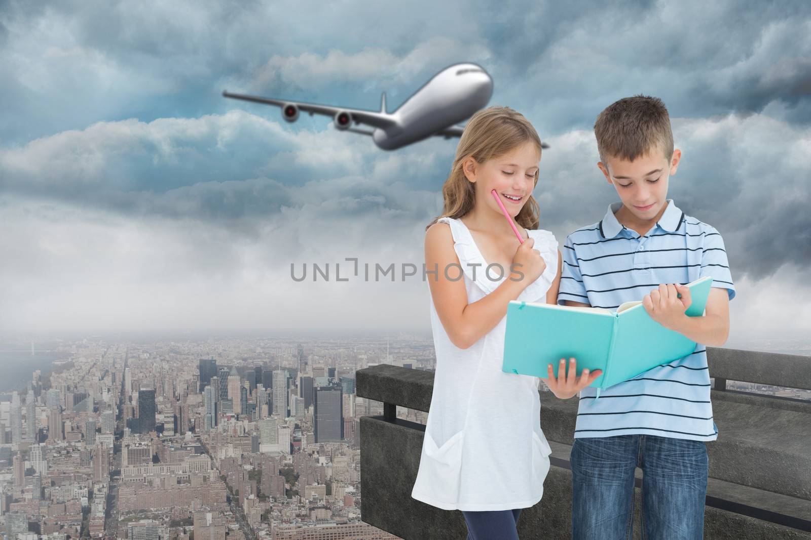 Composite image of concentrated brother and sister learning their lesson together by Wavebreakmedia