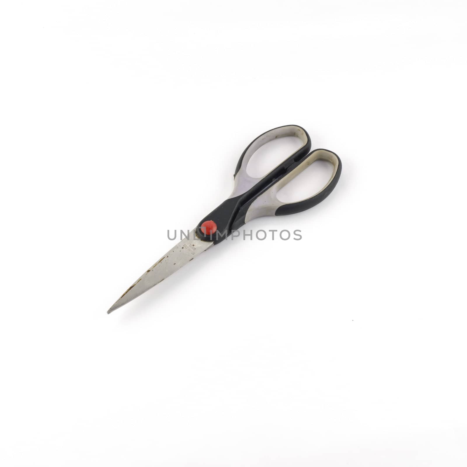 Scissors isolated on white by ammza12